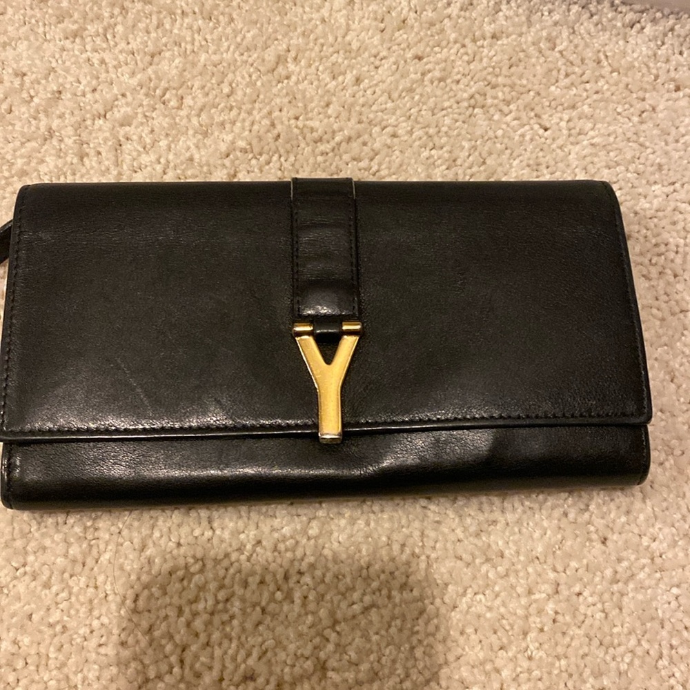 YSL BLACK WALLET with slots for 16 cards 
Gold hardware